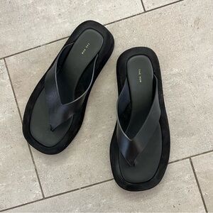 THE ROW Ginza leather and suede platform flip flops. Black.